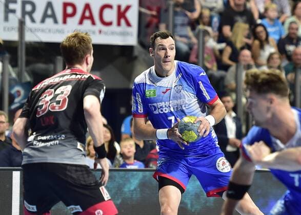 15.09.2019 - Handball - 1. Bundesliga DKB HBL - Saison 2019 2020 - 05. Spieltag: HC Erlangen Metropolregion Nürnberg HCE - TBV Lemgo Lippe - OGo - Nikolai Link (33, HC Erlangen HCE ) Isaias Guardiola (7, TBV Lemgo )