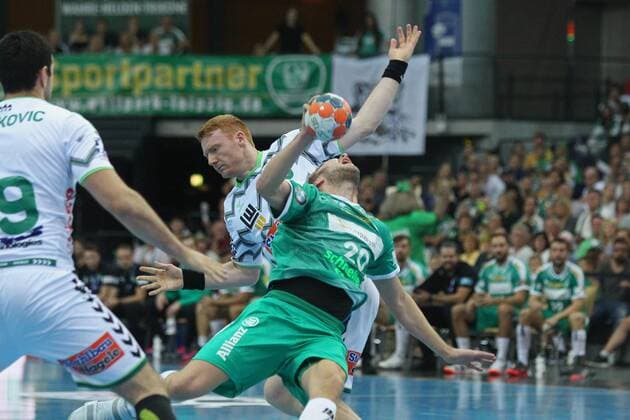 SC DHfK Leipzig vs. FA Goeppingen, Liqui Moly HBL, 15.09.19 Handball, 1. Bundesliga, Saison 2019 2020, 5. Spieltag: SC DHfK Leipzig vs. FRISCH AUF Goeppingen am 15.09.19 in der Arena Leipzig. Im Bild: Philipp WEBER ( 20, SC DHfK Leipzig) gefoult von Nicolai THEILINGER ( 3, FA Goeppingen) Copyright: xBEAUTIFULxSPORTS JanxKaeferx