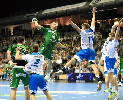 GER, DHB, 1.HBL, FUECHSE BERLIN VS. TVB Stuttgart 15.09.2019, Max Schmeling Halle, Berlin, GER, DHB, 1.HBL, FUECHSE BERLIN VS. TVB Stuttgart, DHB regulations prohibit any use of photographs as image sequences and or quasi-video im Bild Paul Drux (Fuechse Berlin 95), Adam Loenn (Stuttgart 11), Samuel Roethlisberger (Stuttgart 17)