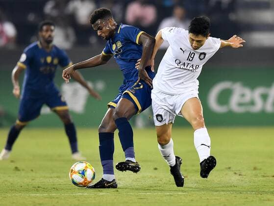 (190917) -- DOHA, Sept. 17, 2019 -- Nam Tae-hee (R) of Qatar s Al Sadd vies with Abdullah Al-Khaibari of Saudi s Al-Nassr during their second leg of the quarterfinal match at the AFC Champions League in Doha, capital of Qatar, Sept. 16, 2019. Al Sadd won the match 3-1 and qualified to the semifinal on a 4-3 aggregate score. (Photo by Nikku Xinhua) (SP)QATAR-DOHA-SOCCER-AFC CHAMPIONS LEAGUE-QUARTERFINAL yangyuanyong 