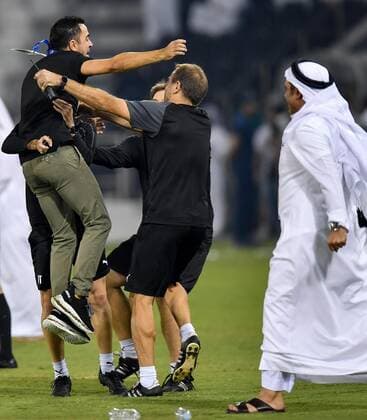 (190917) -- DOHA, Sept. 17, 2019 -- Qatar s Al Sadd s head coach Xavi Hernandez (1st L) celebrates after the team winning the second leg of the quarterfinal match against Saudi s Al-Nassr at the AFC Champions League in Doha, capital of Qatar, Sept. 16, 2019. Al Sadd won the match 3-1 and qualified to the semifinal on a 4-3 aggregate score. (Photo by Nikku Xinhua) (SP)QATAR-DOHA-SOCCER-AFC CHAMPIONS LEAGUE-QUARTERFINAL yangyuanyong 