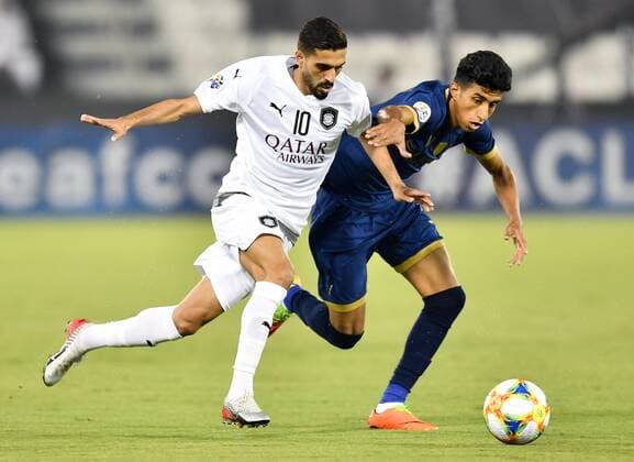 (190917) -- DOHA, Sept. 17, 2019 -- Hassan Al Haydos (L) of Qatar s Al Sadd vies with Fahad Bin Jumayah of Saudi s Al-Nassr during their second leg of the quarterfinal match at the AFC Champions League in Doha, capital of Qatar, Sept. 16, 2019. Al Sadd won the match 3-1 and qualified to the semifinal on a 4-3 aggregate score. (Photo by Nikku Xinhua) (SP)QATAR-DOHA-SOCCER-AFC CHAMPIONS LEAGUE-QUARTERFINAL yangyuanyong 
