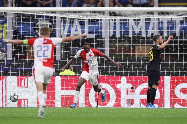 Peter Olayinka of Slavia Prague celebrates after scoring to give the side a 1-0 lead during the UEFA Champions League match at the San Siro, Milan. Picture date: 17th September 2019. Picture credit should read: Jonathan Moscrop Sportimage EDITORIAL USE ONLY. No use with unauthorised audio, video, data, fixture lists, club league logos or live services. Online in-match use limited to 120 images, no video emulation. No use in betting, games or single club league player publications. SPI-0207-0011