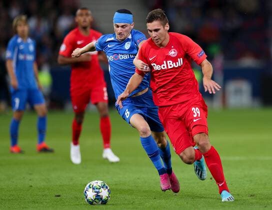 SOCCER - CL, RBS vs Genk SALZBURG,AUSTRIA,17.SEP.19 - SOCCER - UEFA Champions League, group stage, Red Bull Salzburg vs KRC Genk. Image shows Bryan Heynen (Genk) and Maximilian Wöber (RBS). GEPAxpictures xPatrickxSteiner