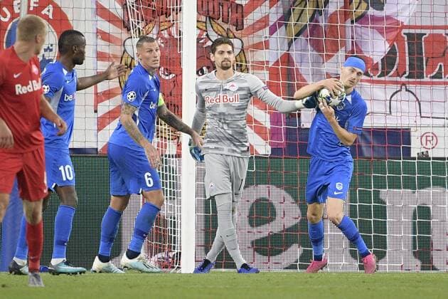 Genk s Sebastien Dewaest, Salzburg s Cican Stankovic and Genk s Bryan Heynen pictured during a game between Austrian club RB Salzburg and Belgian RC Genk, Tuesday 17 September 2019 in Salzburg, Austria, first match in the group stage of the UEFA Champions League. YORICKxJANSENS  x05665940x