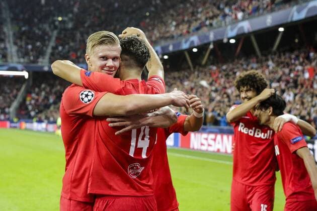 SOCCER - CL, RBS vs Genk SALZBURG,AUSTRIA,17.SEP.19 - SOCCER - UEFA Champions League, group stage, Red Bull Salzburg vs KRC Genk. Image shows the rejoicing of Erling Haaland (RBS), Dominik Szoboszlai (RBS), Andre Ramalho (RBS) and Takumi Minamino (RBS). GEPAxpictures xJasminxWalter