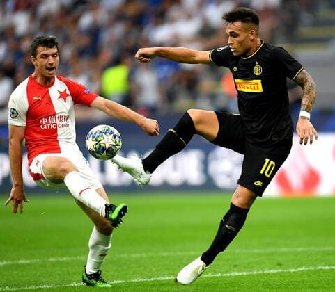(190918) -- MILAN, Sept. 18, 2019 -- Lautaro Martinez (R) of Inter Milan vies with Josef Husbauer of Slavia Praha during the Group F match at the 2019-2020 UEFA Champions League in Milan, Italy, Sept. 17, 2019. ) (SP)ITALY-MILAN-SOCCER-UEFA CHAMPIONS LEAGUE-INTER MILAN VS SLAVIA PRAGUE DanielexMascolo 