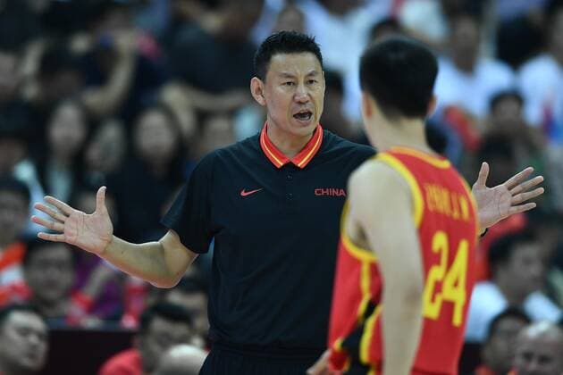 --FILE--Coach Li Nan, left, reacts during a game against Cameroon in Ningbo city, east China s Zhejiang province, 26 July 2019. After the poor performance during the games in 2019 FIBA World Cup, the coach Li Nan who guided the Chinese men s basketball team to a 24th place plans to resign, 18 September 2019.