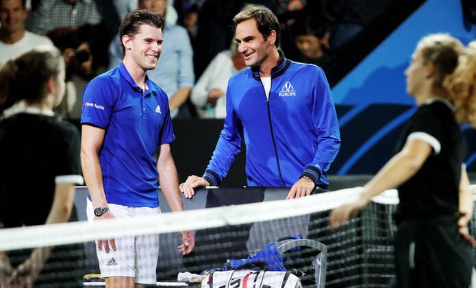 TENNIS - Laver Cup 2019 GENEVA,SWITZERLAND,20.SEP.19 - TENNIS - Laver Cup, Team Europe vs Team World. Image shows Dominic Thiem (AUT) and Roger Federer (SUI). GEPAxpictures xMatthiasxHauer