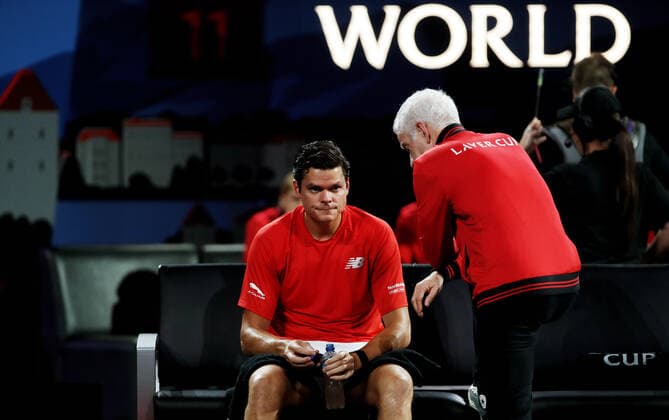 TENNIS - Laver Cup 2019 GENEVA,SWITZERLAND,22.SEP.19 - TENNIS - Laver Cup, Team Europe vs Team World. Image shows Milos Raonic (CAN) and John McEnroe. GEPAxpictures xMatthiasxHauer