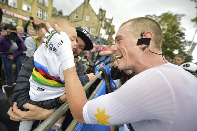 New World Champion Australian Rohan Dennis of Bahrain-Merida greets his wife Melissa Hoskins and their son, at the finish of the Men Elite Individual Time Trial at the UCI Road World Championships cycling in Harrogate, North Yorkshire, United Kingdom, Wednesday 25 September 2019. The Worlds are taking place from 21 to 29 September. YORICKxJANSENS  x05671328x