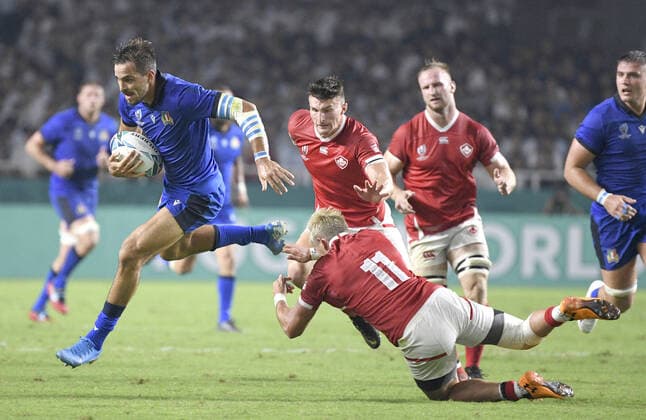 Rugby World Cup in Japan: Italy v Canada Mattia Bellini of Italy breaks through a tackle during the second half of a Rugby World Cup Pool B match against Canada on Sept. 26, 2019, in Fukuoka, southwestern Japan. 