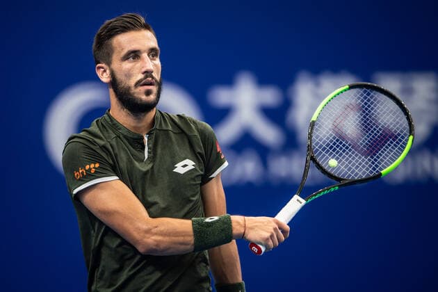 Adrian Mannarino defeats Damir Dzumhur at second round of 2019 Zhuhai Championships, Bosnian professional tennis player Damir Dzumhur competes against French professional tennis player Adrian Mannarino at the second round of 2019 Zhuhai Championships, in Zhuhai city, south China s Guangdong province, 27 September 2019.....French professional tennis player Adrian Mannarino defeated Bosnian professional tennis player Damir Dzumhur with 2-0 at the second round of 2019 Zhuhai Championships, in Zhuhai city, south China s Guangdong province, 27 September 2019.