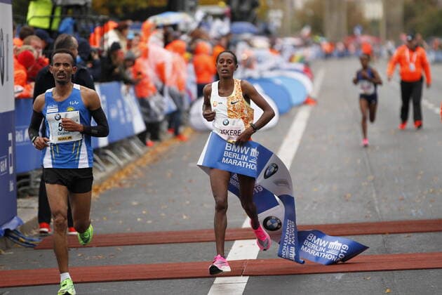 Germany: Kenenisa Bekele wins the 46th Berlin Marathon Kenenisa Bekele won the 46th Berlin Marathon in 2:01:41 hours, just short of the world record. For the women, Ashete Bekere won - Ethiopian double success. Ashete Bekere made it 42 kilometers in 2:20:14 hours. Second was her compatriot Mare Dibaba, eight seconds behind. Germany s Melat Kejeta made it 2:23:58 in her first marathon. Berlin Germany  SimonexKuhlmeyx xPacificxPress