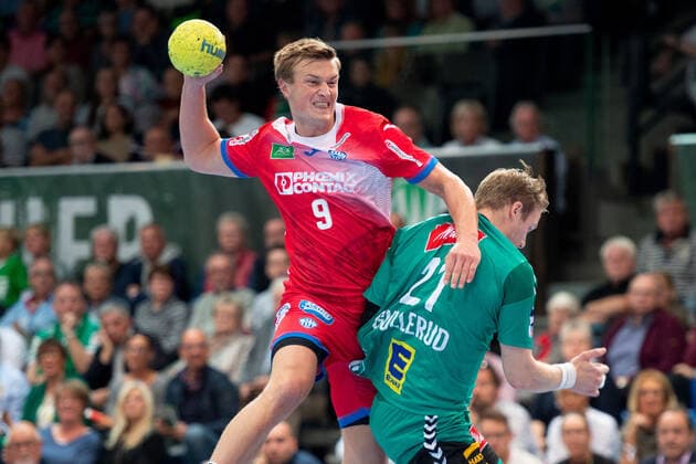 Minden, Deutschland 29.09.2019: 1. Handball-Bundesliga - 2019 2020 - GWD Minden vs. TBV Lemgo Lippe (L-R) Jonathan Carlsbogard (Lemgo), Magnus Gullerud (Minden) Minden Nordrhein-Westfalen Deutschland Kampa-Halle