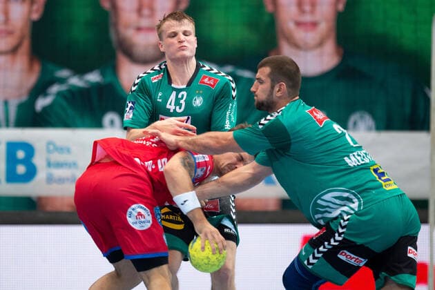 Minden, Deutschland 29.09.2019: 1. Handball-Bundesliga - 2019 2020 - GWD Minden vs. TBV Lemgo Lippe (L-R) Dani Baijens (Lemgo), Christoph Reißky (Minden), Lucas Meister (Minden) Minden Nordrhein-Westfalen Deutschland Kampa-Halle
