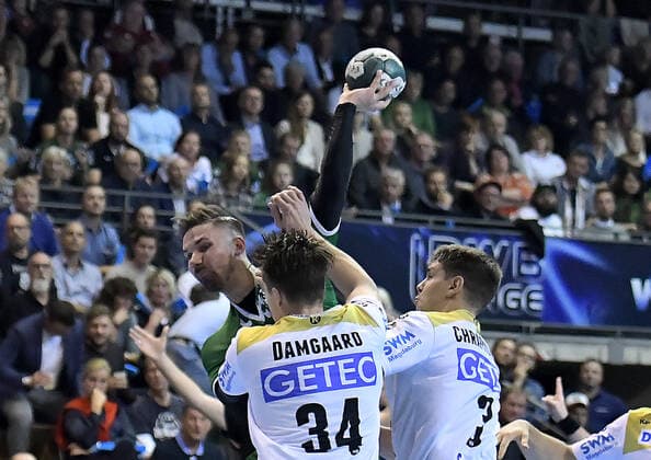 01.10.2019, xlakx, Handball DHB Pokal, Fuechse Berlin - SC Magdeburg emspor, v.l. zum Wurf Fabian Wiede(Fuechse Berlin 3),Michael Damgaard (SC Magdeburg 34) Berlin