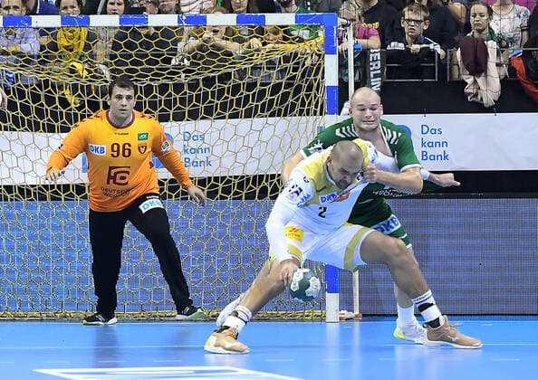 01.10.2019, xlakx, Handball DHB Pokal, Fuechse Berlin - SC Magdeburg emspor, v.l. Dejan Milosavljev(Fuechse Berlin 96),Zeljko Musa (SC Magdeburg 2),Paul Drux(Fuechse Berlin 95) Berlin