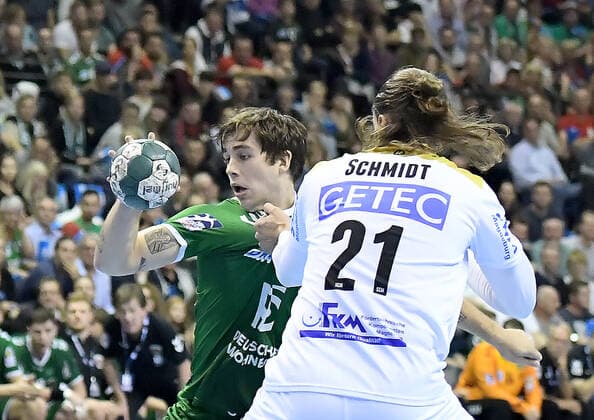 01.10.2019, xlakx, Handball DHB Pokal, Fuechse Berlin - SC Magdeburg emspor, v.l.Zweikampf am Ball Jacob Tandrup Holm(Fuechse Berlin 6),Erik Schmidt (SC Magdeburg 21) Berlin