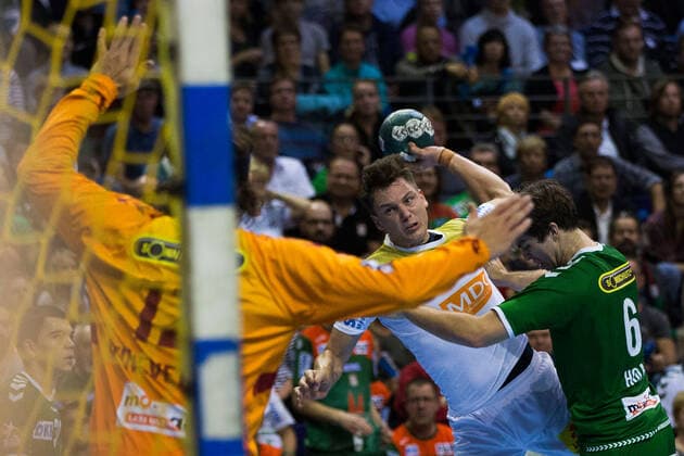 01.10.2019, xfrx, Handball DHB Pokal, Fuechse Berlin - SC Magdeburg emspor, v.l. Silvio Heinevetter (Fuechse Berlin), Christoph Steinert (SC Magdeburg),Jacob Tandrup Holm (Fuechse Berlin) (DFL DFB REGULATIONS PROHIBIT ANY USE OF PHOTOGRAPHS as IMAGE SEQUENCES and or QUASI-VIDEO) Berlin