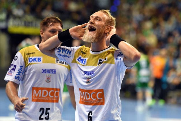 Sport Bilder des Tages Matthias Musche (Magdeburg), jubeltmnach einem Tor, links Marko Bezjak (Magdeburg), Füchse Berlin - SC Magdeburg DHB-Pokal, Achtelfinale 2019 2020, Herren, Männer, Handball, Deutschland, Germany, Max-Schmeling-Halle Berlin, 1.10.2019