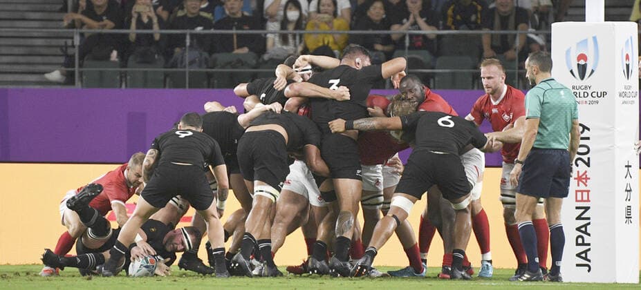 Rugby World Cup in Japan: N.Z. v Canada New Zealand players (black) in a scrum make progress toward the try line during the first half of a Rugby World Cup Pool B match against Canada on Oct. 2, 2019, in Oita, southwestern Japan. New Zealand were subsequently awarded a penalty try. 