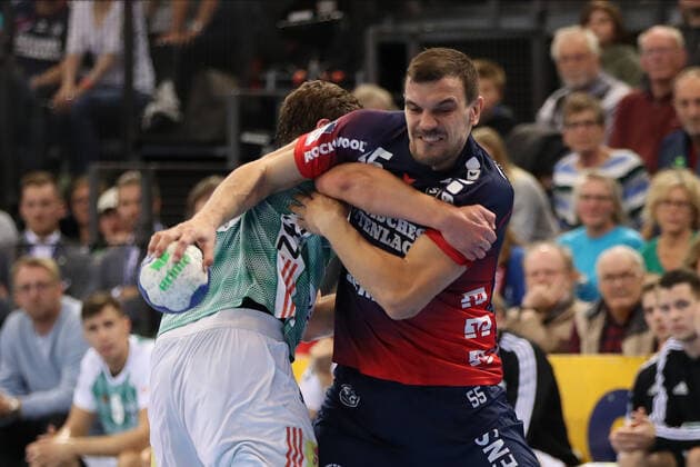 SG Flensburg-Handewitt vs TSV Hannover-Burgdorf, DHB-Pokal Achtelfinale, Flensburg; 03.10.19 Michel Jurecki (SG Flensburg-Handewitt, 55) gegen Malte Donker (TSV Hannover-Burgdorf, 39) Copyright: xBEAUTIFULxSPORTS MarioxM.xKobergx