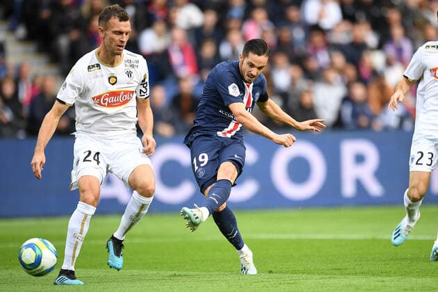 (191006) -- PARIS, Oct. 6, 2019 (Xinhua) -- Pablo Sarabia (R) of Paris Saint-Germain vies with Romain Thomas of Angers during the Ligue 1 match between Paris Saint-Germain (PSG) and Angers at Parc des Princes in Paris, France, Oct. 5, 2019, (Photo by Jack Chan Xinhua) (SP)FRANCE-PARIS-LIGUE 1-PSG VS ANGERS 