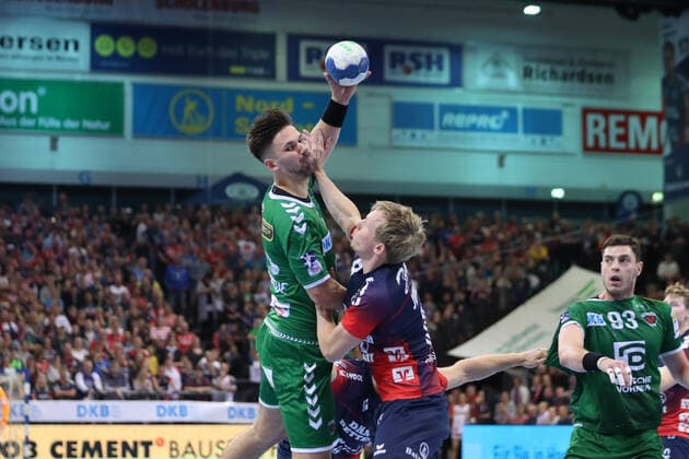 SG Flensburg-Handewitt vs Fuechse Berlin, 06.10.19, LIQUI-MOLY Handball-Bundesliga, Fabian Wiede (Fuechse Berlin, 03) gegen Magnus Joendal (SG Flensburg-Handewitt, 18) Copyright: xBEAUTIFULxSPORTS MarioxM.xKobergx