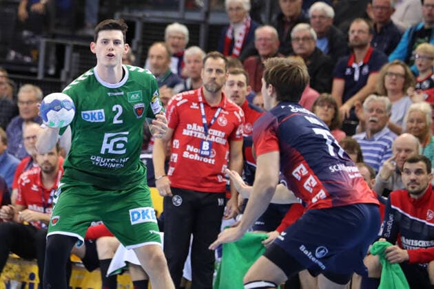 SG Flensburg-Handewitt vs Fuechse Berlin, 06.10.19, LIQUI-MOLY Handball-Bundesliga, Simon Ernst (Fuechse Berlin, 02) gegen Magnus Roed (SG Flensburg-Handewitt, 77) Copyright: xBEAUTIFULxSPORTS MarioxM.xKobergx
