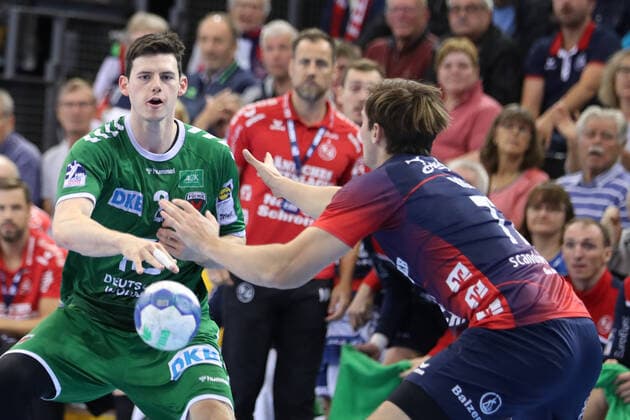 SG Flensburg-Handewitt vs Fuechse Berlin, 06.10.19, LIQUI-MOLY Handball-Bundesliga, Simon Ernst (Fuechse Berlin, 02) gegen Magnus Roed (SG Flensburg-Handewitt, 77) Copyright: xBEAUTIFULxSPORTS MarioxM.xKobergx