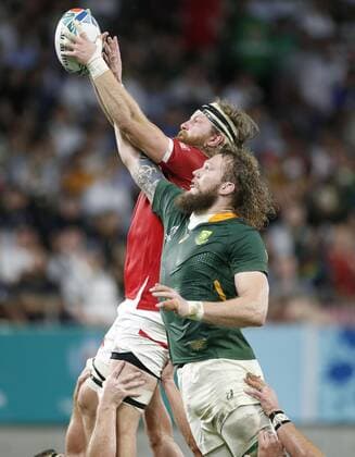 Rugby World Cup in Japan: S. Africa v Canada Canada s Evan Olmstead (back) and South Africa s RG Snyman reach for the ball in a lineout during the first half of a Rugby World Cup Pool B match on Oct. 8, 2019, in Kobe, western Japan. 