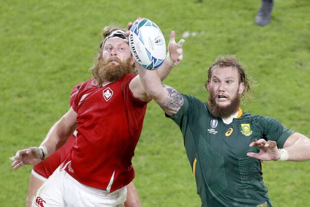 Rugby World Cup in Japan: S. Africa v Canada Canada s Evan Olmstead (L) and South Africa s RG Snyman reach for the ball in a lineout during the second half of a Rugby World Cup Pool B match on Oct. 8, 2019, in Kobe, western Japan. 