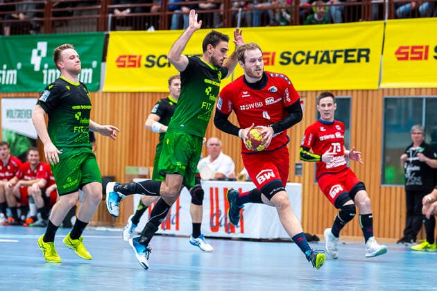 Würzburg, Deutschland 11. Oktober 2019: 2. BL - 19 20- DjK Rimpar Wölfe vs. SG BBM Bietigheim Benjamin Herth (Rimpar), Patrick Rentschler (SG BBM Bietigheim) Würzburg s.Oliver Arena Deutschland