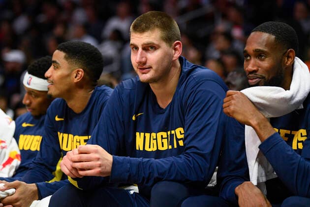 LOS ANGELES, CA - OCTOBER 10: Denver Nuggets Forward Nikola Jokic (15) looks on from the bench during a NBA, Basketball Herren, USA preseason game between the Denver Nuggets and the Los Angeles Clippers on October 10, 2019 at STAPLES Center in Los Angeles, CA. (Photo by Brian Rothmuller Icon Sportswire) NBA: OCT 10 Preseason - Nuggets at Clippers Icon1910104070