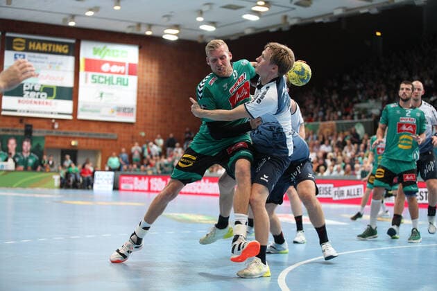 Christoffer Rambo (TSV GWD Minden 9) gegen Magnus Joendal (SG Flensburg-Handewitt 18)(rechts) GER, Handball, 1. Bundesliga, TSV GWD Minden gegen SG Flensburg-Handewitt, 13.10.2019 Minden Copyright: xEIBNER JanxStrohdiekx EP_JSK