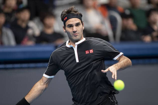 October 14, 2019, Tokyo, Japan: Roger Federer is in his match v John Isner during the UNIQLO Life Wear Day Tokyo charity event at Ariake Coliseum. Professional tennis player Roger Federer who is UNIQLO Global Ambassador took part in a charity event in Tokyo. Federer announced his plans to compete at the Tokyo 2020 Olympics Games. Roger Federer plans to compete in the Tokyo 2020 Olympic Games, Olympische Spiele, Olympia, OS - ZUMAm191 20191014_zap_m191_015 Copyright: xRodrigoxReyesxMarinx