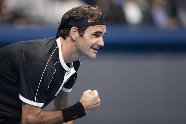 October 14, 2019, Tokyo, Japan: Roger Federer is in his match v John Isner during the UNIQLO Life Wear Day Tokyo charity event at Ariake Coliseum. Professional tennis player Roger Federer who is UNIQLO Global Ambassador took part in a charity event in Tokyo. Federer announced his plans to compete at the Tokyo 2020 Olympics Games. Roger Federer plans to compete in the Tokyo 2020 Olympic Games, Olympische Spiele, Olympia, OS - ZUMAm191 20191014_zap_m191_016 Copyright: xRodrigoxReyesxMarinx