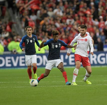 Okay Yokuslu (R) of Turkey and Kingsley Coman of France during the European Championship, EM, Europameisterschaft qualification Group H Match between France and Turkey at Stade de France in Saint-denis , France on October 14 , 2019. 