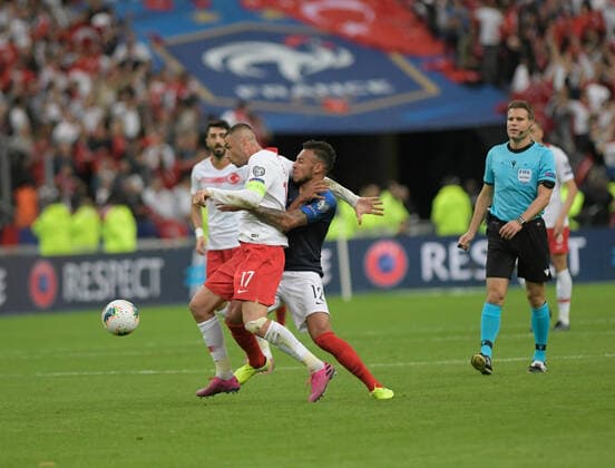 Burak Yilmaz of Turkey and Corentin Tolisso (R) of France during the European Championship, EM, Europameisterschaft qualification Group H Match between France and Turkey at Stade de France in Saint-denis , France on October 14 , 2019. 