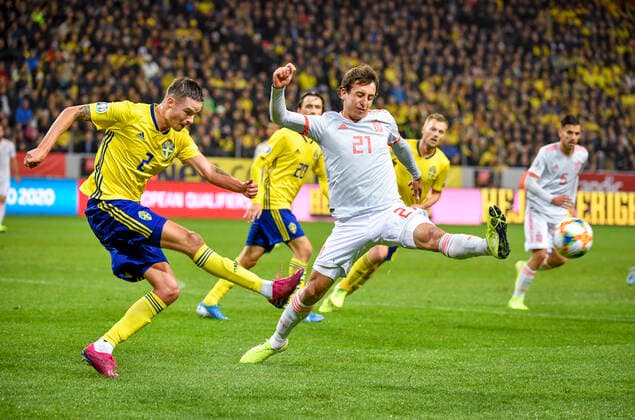 Sweden s Mikael Lustig (L) and Spaibn s Mikel Oyarzabal in action during the Euro 2020 Group F qualification soccer match between Sweden and Spain at Friends Arena in Solna, Stockholm, Sweden, on Oct. 15, 2019. STOCKHOLM SWEDEN SOCCER x10070x