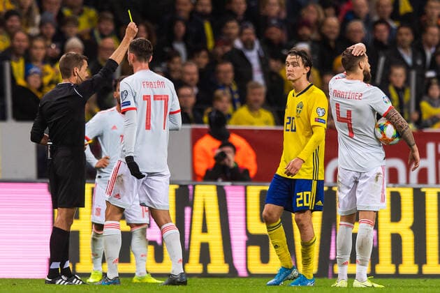191015 Fabian Ruiz of Spain and Kristoffer Olsson of Sweden receive a yellow card from referee Clement Turpin during the UEFA EURO, EM, Europameisterschaft,Fussball Qualifier, EM, Europameisterschaft football match between Sweden and Spain on October 15, 2019 in Stockholm. Copyright: SIMONxHASTEGARD BB191015SH022