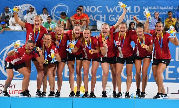 (191017) -- DOHA, Oct. 17, 2019 (Xinhua) -- Gold medalists, players of Denmark, celebrate during the awarding ceremony of the women s beach handball at the 1st ANOC World Beach Games Qatar 2019 in Doha, capital of Qatar, on Oct. 16, 2019. (Photo by Nikku Xinhua) (SP)QATAR-DOHA-WORLD BEACH GAMES-BEACH HANDBALL 