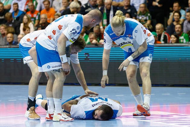 17.10.2019, xtgx, Handball Liqui Moly HBL, SC Magdeburg - TVB Stuttgart emspor, v.l. Zarko Peshevski (Stuttgart, 44) verletzt am Boden GETEC Arena