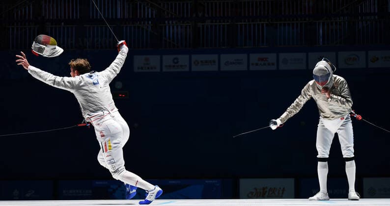Bilder des Jahres 2019, Sport 10 Oktober Sport Themen der Woche KW43 Sport Bilder des Tages (191021) -- WUHAN, Oct. 21, 2019 -- Richard Huebers (L) of Germany celebrates after winning the men s individual sabre gold medal bout of fencing at the 7th CISM Military World Games in Wuhan, capital of central China s Hubei Province, Oct. 21, 2019. ) (SP)CHINA-WUHAN-7TH MILITARY WORLD GAMES-FENCING WangxJianwei 