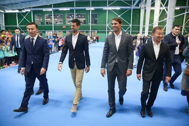 Tennis players Rafael Nadal of Spain (C-R) and Novak Djokovic of Serbia (C-L) arrive to the Barys Arena stadium in Nur-Sultan, Kazakhstan, 24 October 2019. Both world champions will face each other on a charity tennis match later today. Nadal and Djokovic charity match in Nur-Sultan !ACHTUNG: NUR REDAKTIONELLE NUTZUNG!  Copyright: xMaratxKurakovx GRAF6112 20191024-637075220549600022