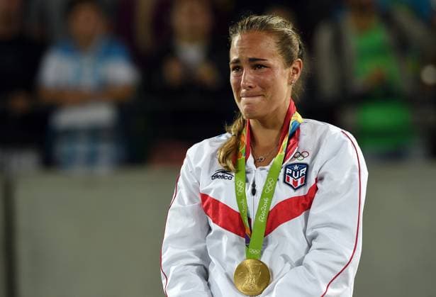 August 13, 2016: 08-13-2016 Rio de Janeiro, Brasil.Juego Olimpico en Rio, dia 6, Tenis final. Monica Puig vs. Angelique Kerber. En la foto Puig con la medalla de oro. Dia 1 juego olimpico, Voleibol, RIO 2016 Copyright: xAndrexKangx