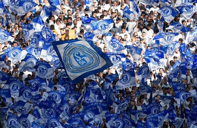 Veltins Arena Gelsenkirchen, 26.10.2019, 1. Fussball Bundesliga Saison 2019 20, 9. Spieltag, Schalke 04 (S04) vs Borussia Dortmund (BVB); Schalke Fans mit vielen blauen Schalke Fahnen DFL REGULATIONS PROHIBIT ANY USE OF PHOTOGRAPHS AS IMAGE SEQUENCES AND OR QUASI-VIDEO