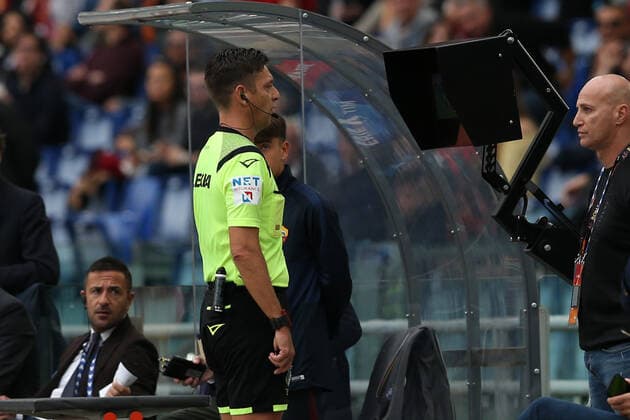 Italy: AS Roma vs SSC Napoli referee Gianluca Rocchi watching the video assistant referee (VAR) just before assigns a penalty during the Serie A match between SS AS Roma and SSC Napoli at Stadio Olimpico on November 2, 2019 in Rome, Italy. Rome beat Napoli by 2-1 in the 11th round of Campionato italiano di Serie A 1DX_0214.JPG Rome Italy Italy  GiuseppexFama PacificxPress