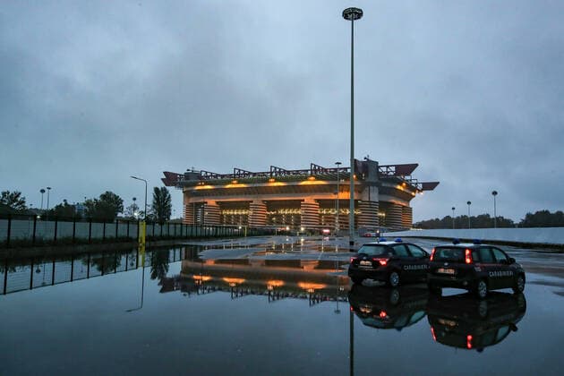 The San Siro stadium reflected in puddles during heavy rainfall before the Serie A match at Giuseppe Meazza, Milan. Picture date: 3rd November 2019. Picture credit should read: Jonathan Moscrop Sportimage EDITORIAL USE ONLY. No use with unauthorised audio, video, data, fixture lists, club league logos or live services. Online in-match use limited to 120 images, no video emulation. No use in betting, games or single club league player publications. SPI-0299-0158